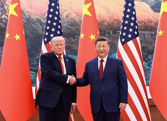 US President Donald Trump (R) shakes hands with China s President Xi Jinping at the Great Hall of the People in Beijing on Thursday May 14, 2026..  CHN202605061410 ChinesexForeignxMinistry