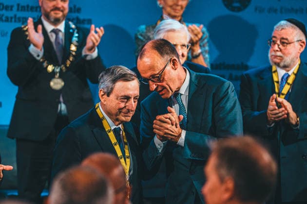 Germany, Aachen Presentation of the International Charlemagne Prize 2026 to Mario Draghi, Mario Draghi, former President of the European Central Bank ECB, Italian Prime Minister a D , Friedrich Merz CDU , German Chancellor, Federal Chairman CDU talks to Draghi, applause Copyright: xThiemoxRudolphx