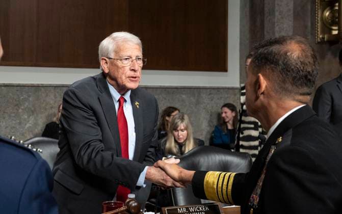 United States Senator Roger Wicker (Republican of Mississippi), Chair, US Senate Committee on Armed Services, left greets Admiral Charles B Cooper II, US Navy, Commander, US Central Command (CENTCOM) prior to the US Senate Committee on Armed Services hearing to ‘examine the posture of CENTCOM and USAFRICOM in review of the Defense Authorization Request for FY2027,’ in the Dirksen Senate Office Building on Capitol Hill in Washington, DC, USA, on Thursday, May 14, 2026. Copyright: xAndrewxThomasx xCNPx MediaPunchx