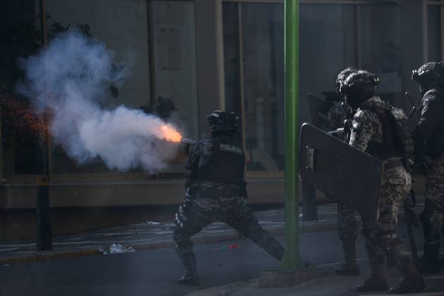 Miners attempt to break through police cordon in La Paz LA PAZ, BOLIVIA - MAY 14: Riot police fire tear gas toward protesting miners in an attempt to disperse demonstrators during clashes in downtown La Paz, Bolivia, on May 14, 2026. Carlos Sanchez Navas Anadolu La Paz Bolivia. Editorial use only. Please get in touch for any other usage.  Copyright: x2026xAnadoluxCarlosxSanchezxNavasx