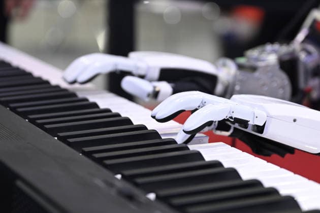 HANGZHOU, CHINA - MAY 14: A humanoid robot plays the piano during the 2nd Hangzhou International Humanoid Robot and Robot Technology Exhibition 2026 on May 14, 2026 in Hangzhou, Zhejiang Province of China.  Copyright: xVCGx 111641476869