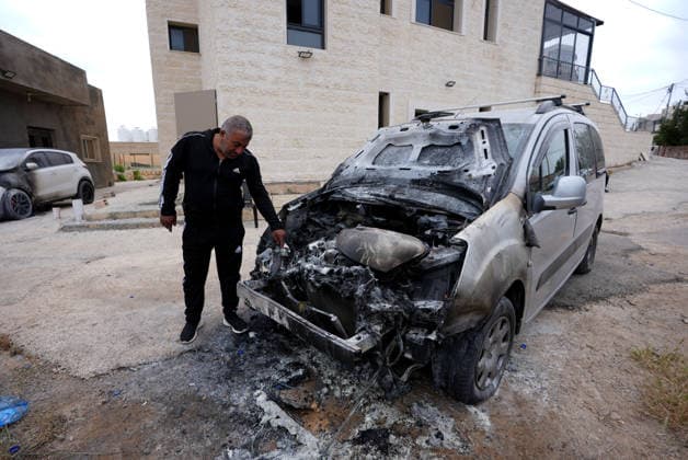 Palestinian homes and vehicles destroyed in the West Bank after Israelis attack RAMALLAH, WEST BANK, PALESTINE - MAY 15: A view of a burnt vehicle is seen after Israeli settlers attacked the village of Jibiya, Ramallah, West Bank, Palestine and set fire to Palestinian-owned homes and vehicles on May 15, 2026. Issam Rimawi Anadolu Ramallah West Bank. Editorial use only. Please get in touch for any other usage.  Copyright: x2026xAnadoluxIssamxRimawix