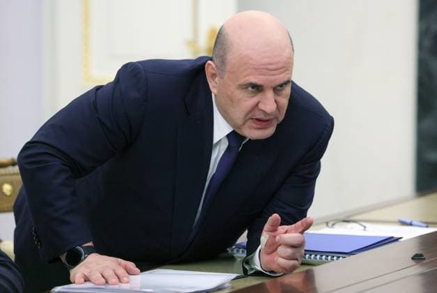 Russia Putin Economy 9165961 15.05.2026 Russian Prime Minister Mikhail Mishustin takes his seat before a meeting on economic issues held by President Vladimir Putin at the Kremlin in Moscow, Russia. Mikhail Metzel Sputnik Moscow Russia  Copyright: xMikhailxMetzelx