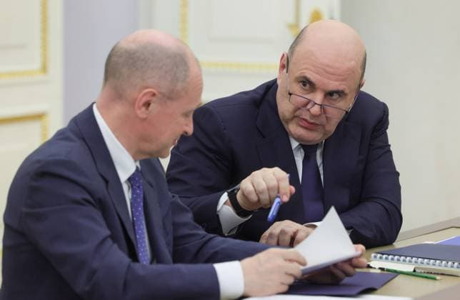 Russia Putin Economy 9165972 15.05.2026 Russian Prime Minister Mikhail Mishustin speaks with First Deputy Chief of Staff of the Presidential Executive Office Sergei Kiriyenko before a meeting on economic issues held by President Vladimir Putin at the Kremlin in Moscow, Russia. Mikhail Metzel Sputnik Moscow Russia  Copyright: xMikhailxMetzelx