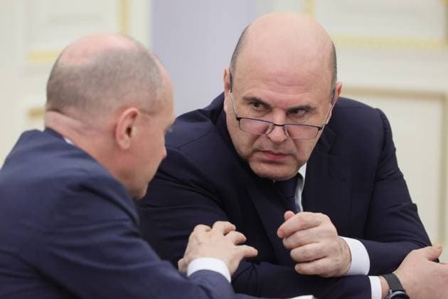 Russia Putin Economy 9165979 15.05.2026 Russian Prime Minister Mikhail Mishustin speaks with First Deputy Chief of Staff of the Presidential Executive Office Sergei Kiriyenko before a meeting on economic issues held by President Vladimir Putin at the Kremlin in Moscow, Russia. Mikhail Metzel Sputnik Moscow Russia  Copyright: xMikhailxMetzelx