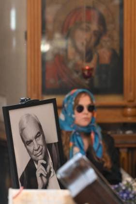Russia TV Host Molchanov Death 9165780 15.05.2026 A portrait of Soviet and Russian television and radio host, speaker, and journalist Vladimir Molchanov, who passed away at the age of 75 on May 11, is displayed during a farewell ceremony before his funeral at the Church of Saints Cosmas and Damian in Moscow, Russia. Grigory Sysoev Sputnik Moscow Russia  Copyright: xGrigoryxSysoevx