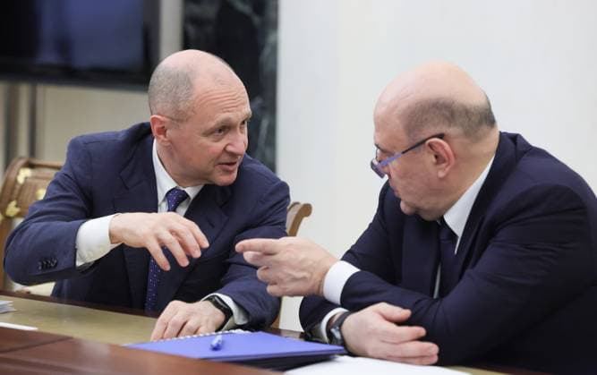 Russia Putin Economy 9165988 15.05.2026 Russian Prime Minister Mikhail Mishustin speaks with First Deputy Chief of Staff of the Presidential Executive Office Sergei Kiriyenko before a meeting on economic issues held by President Vladimir Putin at the Kremlin in Moscow, Russia. Mikhail Metzel Sputnik Moscow Russia  Copyright: xMikhailxMetzelx