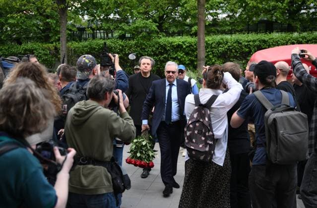 Russia TV Host Molchanov Death 9165753 15.05.2026 VGTRK CEO Oleg Dobrodeyev, centre, and Channel One Director General Konstantin Ernst arrive to attend a farewell ceremony for Soviet and Russian television and radio host, speaker, and journalist Vladimir Molchanov, who passed away at the age of 75 on May 11, before his funeral at the Church of Saints Cosmas and Damian in Moscow, Russia. Grigory Sysoev Sputnik Moscow Russia  Copyright: xGrigoryxSysoevx