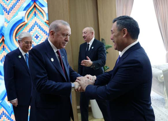 Informal Summit of the Organization of Turkic States in Kazakhstan TURKISTAN, KAZAKHSTAN - MAY 15: (----EDITORIAL USE ONLY - MANDATORY CREDIT - TURKISH PRESIDENCY HANDOUT - NO MARKETING NO ADVERTISING CAMPAIGNS - DISTRIBUTED AS A SERVICE TO CLIENTS----) Turkish President Recep Tayyip Erdogan and Kyrgyz President Sadyr Japarov shake hands ahead of the Informal Summit of the Organization of Turkic States (OTS) at the Turkistan Congress Center in Turkistan, Kazakhstan on May 15, 2026. Turkish Presidency Anadolu Turkistan Kazakhstan. Editorial use only. Please get in touch for any other usage.  Copyright: x2026xAnadoluxTurkishxPresidencyx
