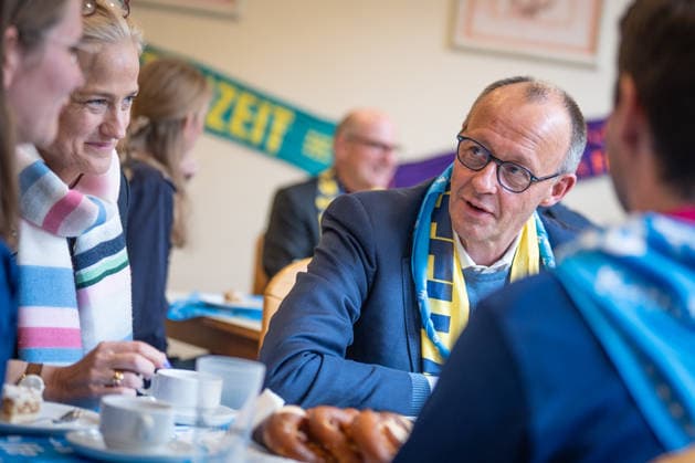 Katholikentag 2026 in Würzburg Federal Chancellor at the catering for volunteers Federal Chancellor Friedrich Merz visits the Katholikentag and takes part in the catering for volunteers, Würzburg Bavaria Germany Place of remembrance ILBA