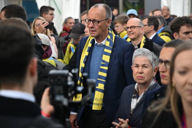 Federal Chancellor Friedrich Merz CDU, M on a tour of the Katholikentag in Würzburg, to his right Irme Stetter Karp, Presi Copyright: epd-bild DanielxPeter DSC_1549.jpeg