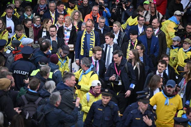 Chancellor Friedrich Merz CDU, M with Katholikentag scarf on a tour of the Katholikentag in Wuerzburg in the photo from 15 05 2026 Several tens of thousands of participants are expected to attend a tota Copyright: epd-bild DanielxPeter DSC_1712.jpeg