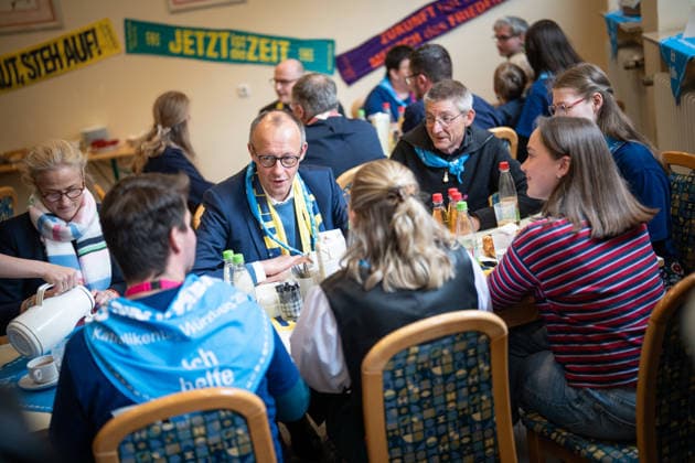 Katholikentag 2026 in Würzburg Federal Chancellor at the catering for volunteers Federal Chancellor Friedrich Merz visits the Katholikentag and takes part in the catering for volunteers, Würzburg Bavaria Germany Place of remembrance ILBA