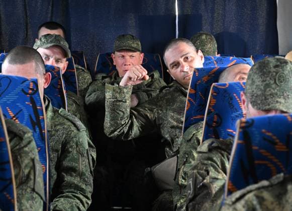 Russia Ukraine Military Operation POWs Exchange 9166360 15.05.2026 Russian prisoners of war, released from Ukrainian captivity amid Russia™s military operation in Ukraine, sit in a bus upon arrival at an airfield in Moscow region, Russia. Russia and â Ukraine swapped 205 prisoners of war each on May 15, part of an agreement linked to a three-day ceasefire earlier this month brokered by ‹U.S. â President Donald Trump. Ilya Pitalev Sputnik Moscow region Russia  Copyright: xIlyaxPitalevx