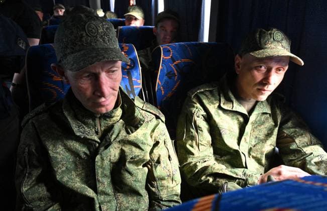 Russia Ukraine Military Operation POWs Exchange 9166377 15.05.2026 Russian prisoners of war, released from Ukrainian captivity amid Russia™s military operation in Ukraine, sit in a bus upon arrival at an airfield in Moscow region, Russia. Russia and â Ukraine swapped 205 prisoners of war each on May 15, part of an agreement linked to a three-day ceasefire earlier this month brokered by ‹U.S. â President Donald Trump. Ilya Pitalev Sputnik Moscow region Russia  Copyright: xIlyaxPitalevx