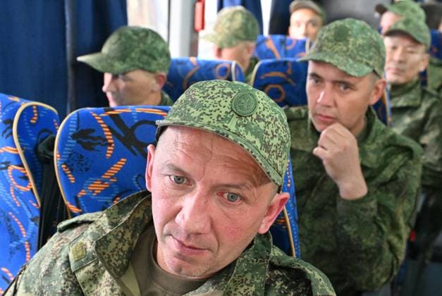 Russia Ukraine Military Operation POWs Exchange 9166390 15.05.2026 Russian prisoners of war, released from Ukrainian captivity amid Russia™s military operation in Ukraine, sit in a bus upon arrival at an airfield in Moscow region, Russia. Russia and â Ukraine swapped 205 prisoners of war each on May 15, part of an agreement linked to a three-day ceasefire earlier this month brokered by ‹U.S. â President Donald Trump. Ilya Pitalev Sputnik Moscow region Russia  Copyright: xIlyaxPitalevx