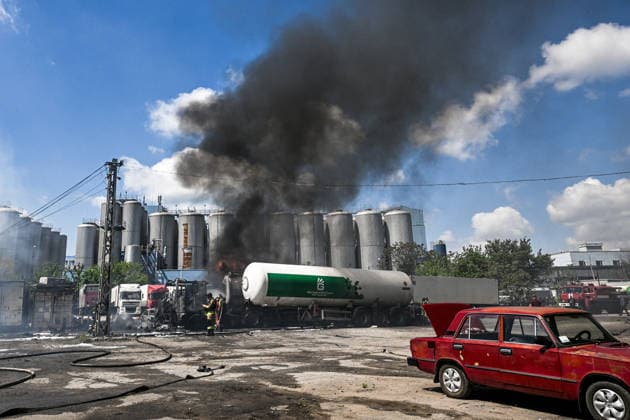 Tank trucks used by a private company to supply petrol station chains are damaged by a Russian drone attack in Zaporizhzhia, Ukraine, on May 15, 2026. Russian troops struck an industrial facility, damaging a fuel cistern and causing tank trucks to catch fire. One civilian employee (a driver) was killed, and three other company employees sustained serious injuries in the explosion. (Photo by Dmytro Smolienko Ukrinform) Russian troops strike fuel truck fleet in Zaporizhzhia  Copyright: xDmytroxSmolienkox