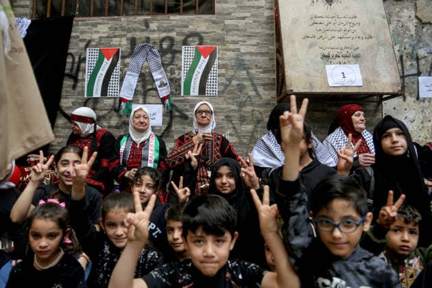 May 15, 2026, Beirut, Beirut, Lebanon: Palestinian elderlies and youths flash the Ã¢â‚¬ËœÃ¢â‚¬â ¢VÃ¢â‚¬â ¢Ã¢â‚¬â ¢ sign as they take part in a ceremony to mark the 78th anniversary of the Nakba Ã¢â‚¬ Arabic for Ã¢â‚¬oecatastropheÃ¢â‚¬Â Ã¢â‚¬ a term that refers to displacement and dispossession of approximately 750,000 Palestinians during the creation of Israel --, at the Palestinian refugee camp of Shatila in Beirut. FridayÃ¢â‚¬â ¢s anniversary is the third Nakba commemoration since IsraelÃ¢â‚¬â ¢s war on Gaza began. Beirut Lebanon  - ZUMAn313 20260515_zip_n313_006 Copyright: xMarwanxNaamanix