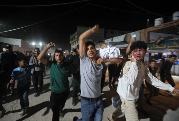 Casualties Arrive at al-Shifa Hospital After Israeli Strike in Gaza City Palestinians carry wounded and killed people into al-Shifa Hospital following an Israeli army strike on a residential building in the Rimal neighborhood of Gaza City, on May 15, 2026. The strike caused casualties, according to local information. Photo by Belal Osama apaimages Gaza Gaza Strip Palestinian Territory 150526_Gaza_BO_00(14) Copyright: xapaimagesxBelalxOsamax xapaimagesx