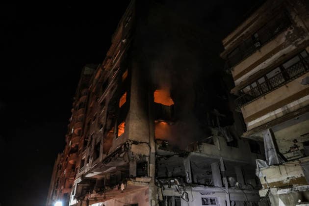 (260515) -- GAZA CITY, May 15, 2026 -- Photo taken on May 15, 2026 shows the damage caused to an apartment building following an Israeli airstrike in al-Rimal neighborhood in Gaza City. Seven Palestinians were killed and at least 50 others injured on Friday evening in Israeli strikes targeting a residential apartment and a vehicle in Gaza City, according to Palestinian medical sources. (Photo by Xinhua) MIDEAST-GAZA CITY-ISRAELI STRIKES-DAMAGE RizekxAbdeljawad 