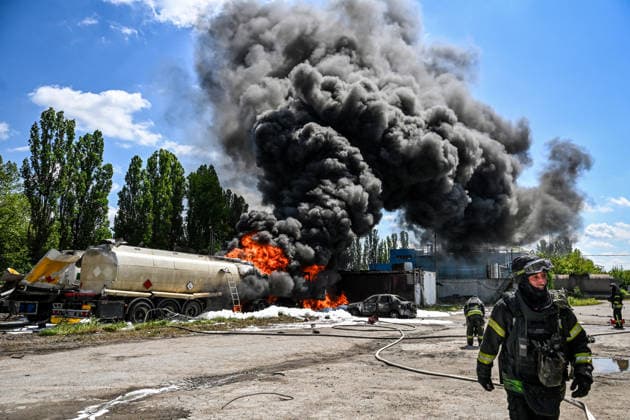 Russian troops strike fuel truck fleet in Zaporizhzhia Rescuers extinguish burning tank trucks used by a private company to supply petrol station chains after a drone strike in Zaporizhzhia, Ukraine, on May 15, 2026. The incident at an industrial facility resulted in damage to a fuel cistern and caused tank trucks to catch fire. One civilian employee, a driver, was killed, and three other company employees sustained serious injuries in the explosion. Zaporizhzhia Ukraine  Copyright: xDmytroxSmolienkox originalFilename: ukrinform-russiant260515_npWz0.jpg