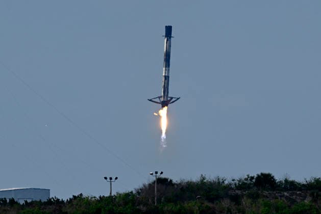 Minutes after launching on mission CRS-34 for NASA, the first stage of SpaceX Falcon 9 booster B-1096 returns to Landing Zone 40 at the Cape Canaveral Space Force Station, Florida on Friday, May 15, 2026. The rocket boosted a Cargo Dragon spacecraft which carried over three tons of equipment and supplies to the International Space Station.  CCP20260515003 JOExMARINO