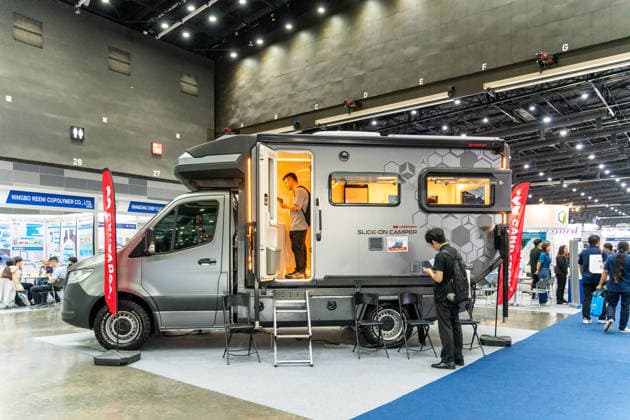May 15, 2026, Bangkok, Thailand: General view of a truck camper, with visitors looking inside and outside, showcased during Future Mobility Thailand 2026 at BITEC. Future Mobility Thailand 2026 is a trade show showcasing the latest automotive and mobility technologies, connecting manufacturers, distributors, and buyers. Bangkok Thailand  - ZUMAs197 20260515_aaa_s197_579 Copyright: xNathaliexJamoisx