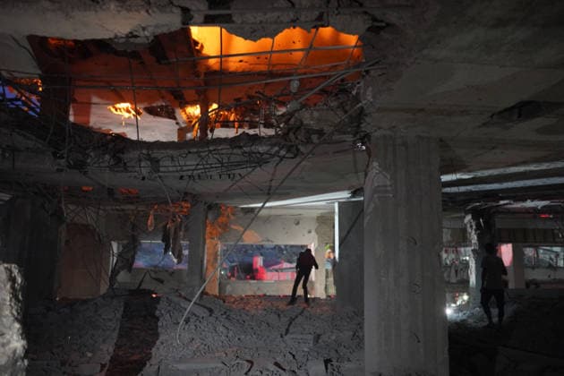 Aftermath Of Israeli Airstrike In Gaza, Palestine People react to a fire following a reported Israeli military operation on a residential building in the Rimal neighborhood of Gaza City on May 15, 2026. Gaza Palestine  Copyright: xMajdixFathix originalFilename: fathi-notitle260515_npImJ.jpg