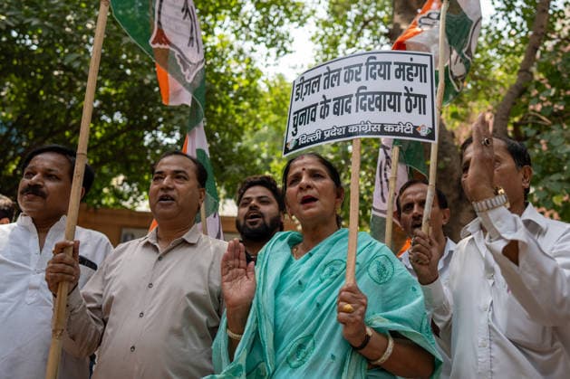 India raises fuel prices amid global energy crisis NEW DELHI, INDIA - MAY 16: Congress party workers stage a protest against the hike in petrol and diesel prices in New Delhi, India on May 16, 2026. Oil marketing companies increased fuel prices by Rs 3 per litre, taking petrol prices in the national capital to Rs 97.77 per litre and diesel prices to Rs 90.67 per litre amid the ongoing global energy crisis and supply disruptions in the Strait of Hormuz. Amarjeet Kumar Singh Anadolu New Delhi India. Editorial use only. Please get in touch for any other usage.  Copyright: x2026xAnadoluxAmarjeetxKumarxSinghx