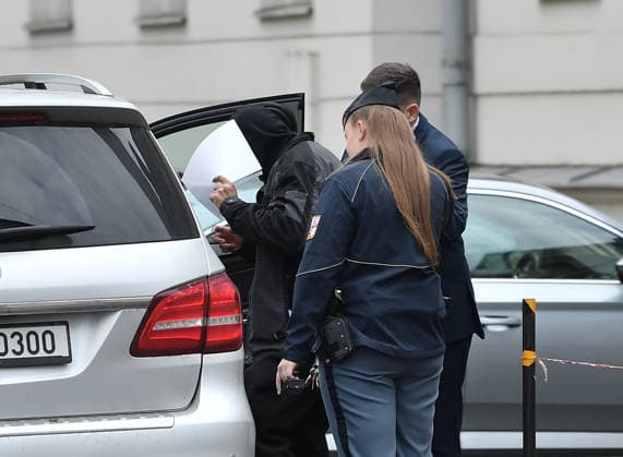 A man (left) suspected of stealing a precious relic, the skull of Saint Zdislava of Lemberk, walks with his lawyer (right) away from the district court that did not send him into custody, in Ceska Lipa, Czech Republic, on May 16, 2026. (CTKxPhoto VitxCerny) CTKPhotoP2026051602526  CTKPhotoP2026051602526