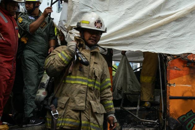 May 16, 2026, Bangkok, Bangkok, Thailand: A train collided with a bus stranded on railway tracks, triggering a fire that engulfed the vehicle, leaving multiple people injured and dead in Bangkok, Thailand, May 16, 2026. Bangkok Thailand - ZUMAp219 20260516_zip_p219_005 Copyright: xNattaphonxPhanphongsanonx
