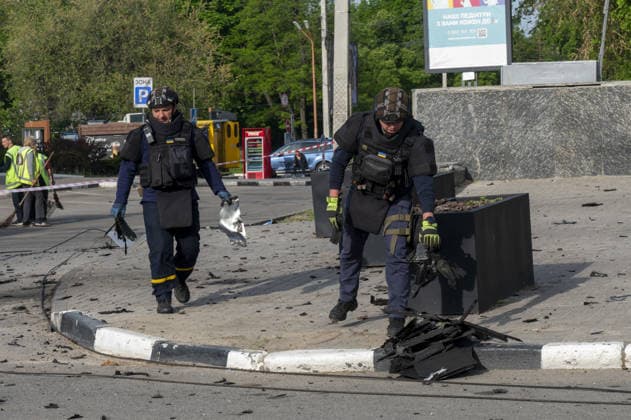 Aftermath of a Russian UAV strike on Kharkiv KHARKIV, UKRAINE - MAY 16: A view of the damage in the area after a Russian UAV strike on a avenue in central Kharkiv, Ukraine on May 16, 2026. The drone struck the road. Three subway exits, three public transportation stops, the trolleybus overhead wire system, and a trolleybus near a stop were damaged. One person was injured. Explosive ordnance disposal experts are on the scene, and municipal workers are clearing up the aftermath of the explosion. Serhii Masin Anadolu Kharkiv Ukraine. Editorial use only. Please get in touch for any other usage.  Copyright: x2026xAnadoluxSerhiixMasinx