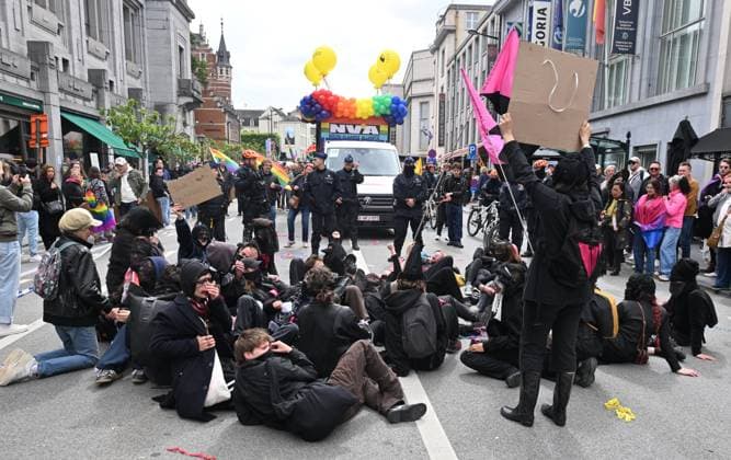 Brussels Pride Celebrates 30 Years BRUSSELS, BELGIUM - MAY 16: Protesters against the partiscipation of NV-A and MR to the Pride have to oppose the Police. The Pride march walks through the streets of the capital.This year marks the 30th anniversary of Pride in Brussels. Thirty years of struggle, pride and visibility for the LGBTQIA+ community. The theme chosen for 2026 reflects the challenges of a world in turmoil: When Times Get Darker, We Shine Brighter. A powerful and unifying message, more necessary than ever in a troubled international context where the rights of the LGBTQIA+ community are under constant threat.on May 16, 2026 in Brussels, Belgium, 16 05 2026 Brussels Belgium  Copyright: xBertxVanxDenxBrouckex