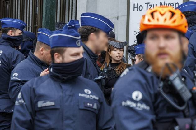 Police pictured during a protest near the N-VA float at the Brussels Pride parade through the streets of Brussels on Saturday 16 May 2026. Brussels Pride puts the LGBTQIA+ community in the spotlight by adorning the streets of Brussels with the colors of the rainbow.  NICOLASxMAETERLINCK 174059526