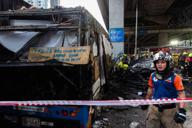 May 16, 2026, Bangkok, Thailand: Rescue workers seen working at the accident site where a cargo train crashed with a public bus at the Makkasan airport rail link station. At least 8 people were killed and more than 25 people injured in the accident. Bangkok Thailand - ZUMAs197 20260516_aaa_s197_090 Copyright: xPeeraponxBoonyakiatx