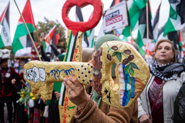 May 16, 2026, Berlin, Berlin, Germany: A Palestinian woman carries a handmade key of return during the Nakba 78 march in Berlin. The key of return is a symbol used by Palestinians to represent their right to return to their homeland. Berlin Germany  - ZUMAc291 20260516_zip_c291_003 Copyright: xMariaxCastrox