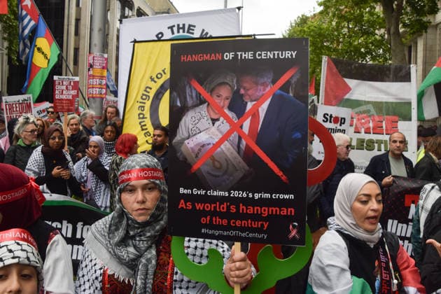 May 16, 2026, London, England, United Kingdom: A protester holds a sign calling Ben Gvir the world s hangman of the century as thousands of people take part in the Nakba 78 March For Palestine. The march commemorates 78 years of the Nakba and is also a protest against Tommy Robinson and the far right, who held their own Unite the Kingdom march at the same time. London United Kingdom  - ZUMAv130 20260516_zip_v130_048 Copyright: xVukxValcicx