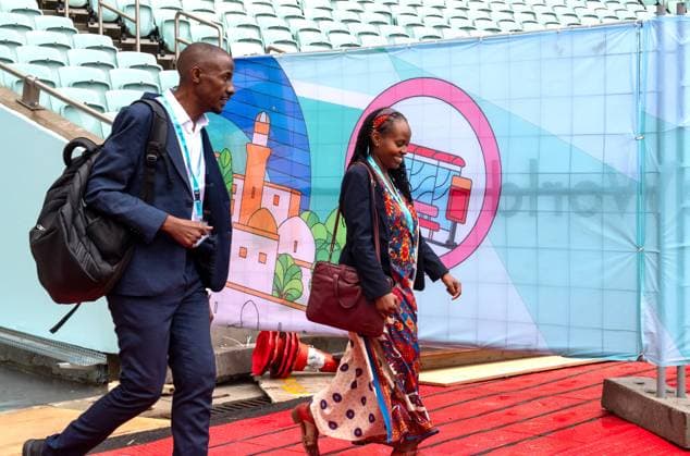 (260517) -- BAKU, May 17, 2026 -- Representatives arrive at the venue for the 13th Session of the World Urban Forum (WUF 13) in Baku, Azerbaijan, May 17, 2026. The WUF 13 opened on Sunday, with global leaders, policymakers and urban experts gathering to discuss the challenges of rapid urbanization and sustainable city development. ) AZERBAIJAN-BAKU-WORLD URBAN FORUM-OPEN ChenxJunfeng 