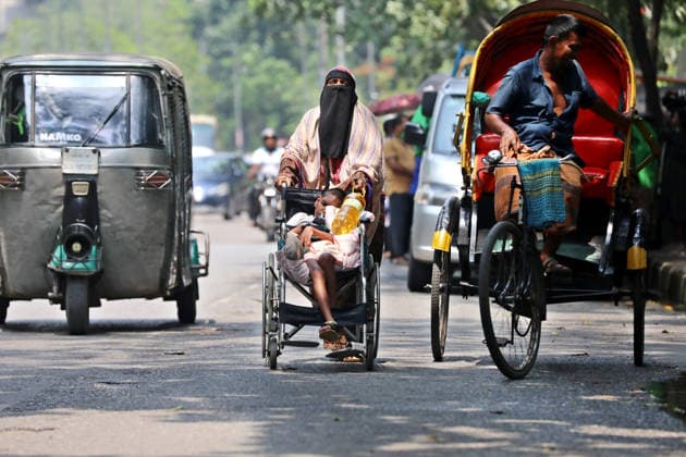 May 17, 2026, Dhaka, Dhaka, Bangladesh: Low-income families stand in line to buy government-subsidized goods from a Trading Corporation of Bangladesh (TCB) truck in Dhaka, Bangladesh, on may 07, 2026 Dhaka Bangladesh  - ZUMAr338 20260517_zip_r338_005 Copyright: xHarun-Or-Rashidx