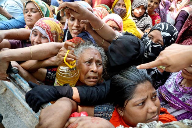 May 17, 2026, Dhaka, Dhaka, Bangladesh: Low-income families stand in line to buy government-subsidized goods from a Trading Corporation of Bangladesh (TCB) truck in Dhaka, Bangladesh, on may 07, 2026 Dhaka Bangladesh  - ZUMAr338 20260517_zip_r338_007 Copyright: xHarun-Or-Rashidx