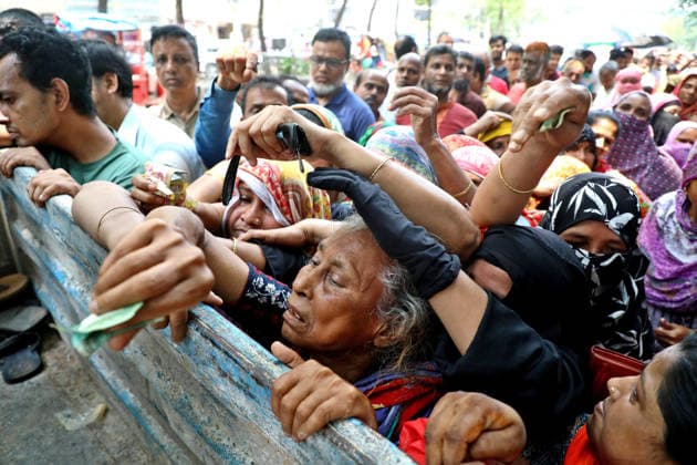 May 17, 2026, Dhaka, Dhaka, Bangladesh: Low-income families stand in line to buy government-subsidized goods from a Trading Corporation of Bangladesh (TCB) truck in Dhaka, Bangladesh, on may 07, 2026 Dhaka Bangladesh  - ZUMAr338 20260517_zip_r338_011 Copyright: xHarun-Or-Rashidx