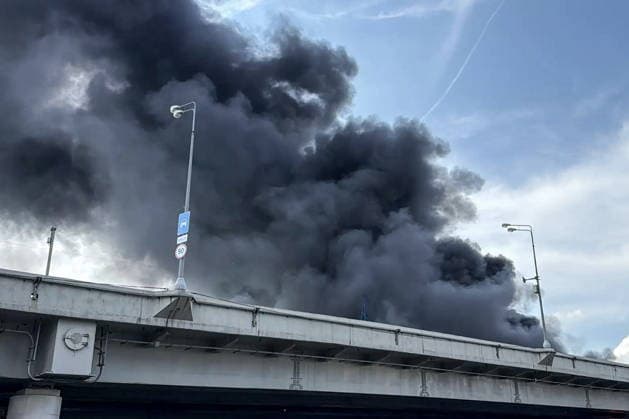 RUSSIA, MOSCOW - MAY 17, 2026: Smoke billows from a fire near Cherkizovskaya station of the Moscow Metro. Ilya Lazarev TASS  92623738