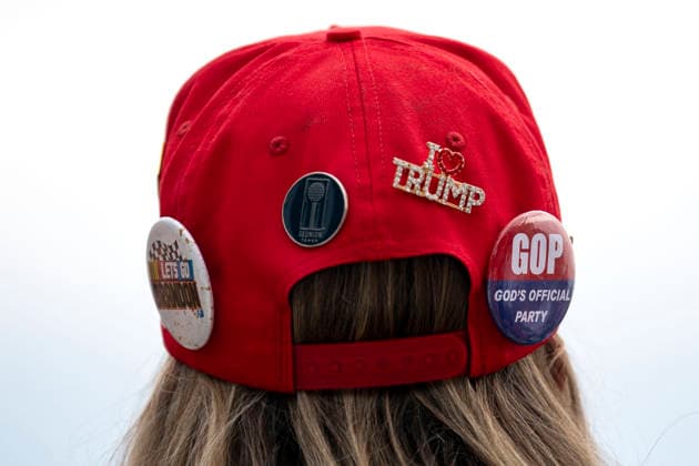 A woman wears a hat with pins while attending Rededicate 250 on the National Mall in Washington, DC on Sunday, May 17, 2026. The event, organized by Freedom 250 and the White House Faith Office, will feature political and faith leaders honoring 250 years of American history and encourage prayer or the country s next 250 years.  WAP20260517334 BONNIExCASH