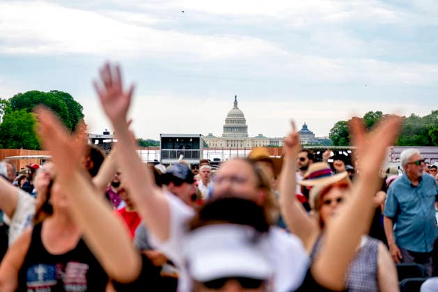 The U.S. Capitol is seen while people worship during Rededicate 250 on the National Mall in Washington, DC on Sunday, May 17, 2026. The event, organized by Freedom 250 and the White House Faith Office, will feature political and faith leaders honoring 250 years of American history and encourage prayer or the country s next 250 years.  WAP20260517335 BONNIExCASH
