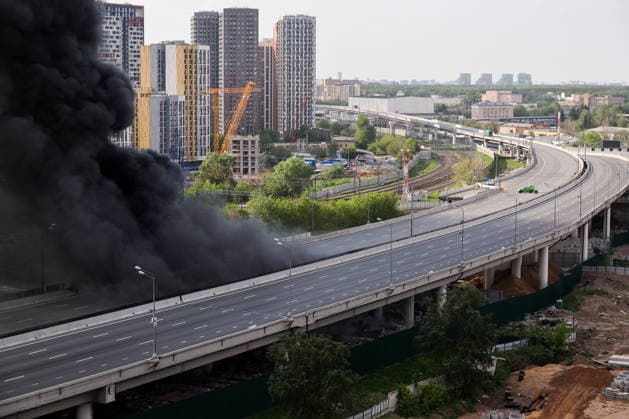 RUSSIA, MOSCOW - MAY 17, 2026: Smoke billows from a fire near Cherkizovskaya station of the Moscow Metro. Sergei Shakhidzhanyan TASS  92629392