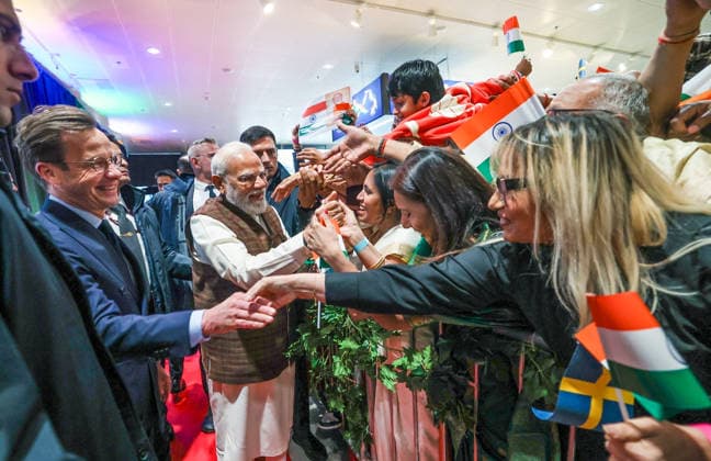 RECORD DATE NOT STATED PM Modi arrives to a warm welcome in Sweden Gothenburg Sweden , May 17 (ANI): Prime Minister Narendra Modi witnesses a reception by the Indian diaspora, in Gothenburg on Sunday. Sweden Prime Minister Ulf Kristersson also present. (Narendra Modi Photo gallery ANI Photo) Gothenburg Sweden Copyright: xANIx ANI_20260517456