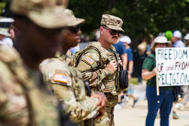 May 17, 2026, Washington, District Of Columbia, USA: Armed soldiers of the US Army National Guard look on as attendees and protesters trade barbs outside the Ã¢â‚¬oeRededicate 250Ã¢â‚¬Â event on the National Mall. Washington USA - ZUMAh196 20260517_znp_h196_013 Copyright: xTomxHudsonx