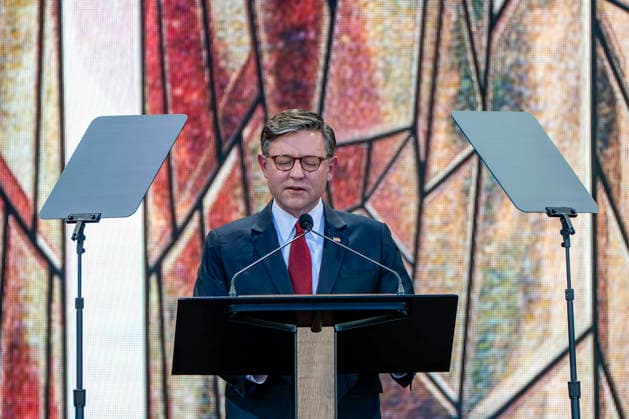 Speaker of the House Mike Johnson, R-LA, leads a prayer during Rededicate 250 on the National Mall in Washington, DC on Sunday, May 17, 2026. The event, organized by Freedom 250 and the White House Faith Office, will feature political and faith leaders honoring 250 years of American history and encourage prayer or the country s next 250 years.  WAP20260517361 BONNIExCASH