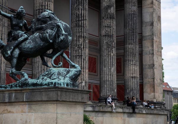 (260518) -- BERLIN, May 18, 2026 -- People sit at the base of the colonnade on the facade of the Altes Museum in Berlin, Germany, May 17, 2026. Museums in Berlin opened to the public free of charge on Sunday in celebration of the upcoming International Museum Day. ) GERMANY-BERLIN-INT L MUSEUM DAY-MUSEUM-FREE ADMISSION ZhangxHaofu 