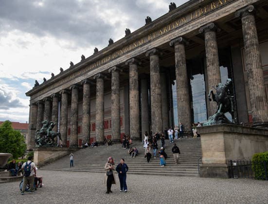 (260518) -- BERLIN, May 18, 2026 -- People walk out of the Altes Museum in Berlin, Germany, May 17, 2026. Museums in Berlin opened to the public free of charge on Sunday in celebration of the upcoming International Museum Day. ) GERMANY-BERLIN-INT L MUSEUM DAY-MUSEUM-FREE ADMISSION ZhangxHaofu 